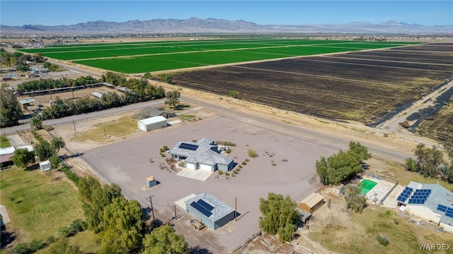 drone / aerial view featuring a rural view and a mountain view