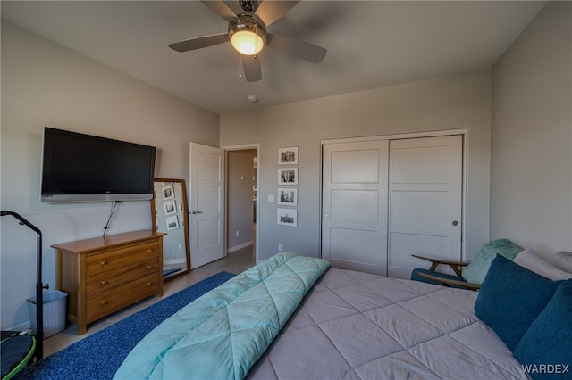 bedroom with a closet and a ceiling fan