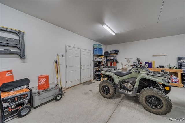 garage with a workshop area