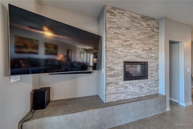 unfurnished living room with tile patterned floors