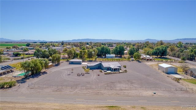 birds eye view of property featuring a mountain view