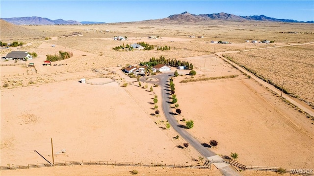 bird's eye view featuring view of desert, a rural view, and a mountain view