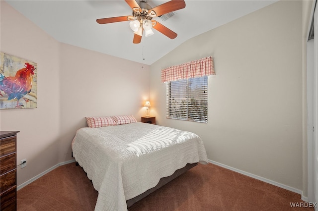 bedroom featuring lofted ceiling, baseboards, dark colored carpet, and a ceiling fan