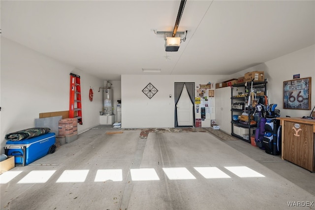 garage featuring gas water heater and a garage door opener