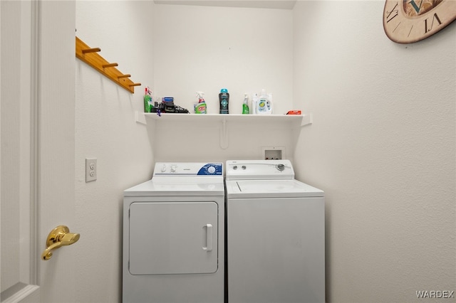 laundry area with laundry area and separate washer and dryer