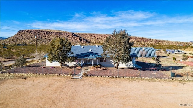 view of front of property with a mountain view