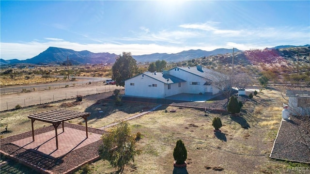 drone / aerial view featuring a mountain view