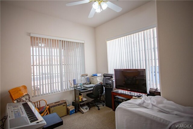 carpeted bedroom with a ceiling fan