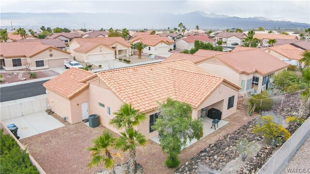 bird's eye view featuring a residential view and a mountain view