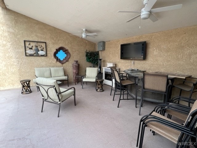 interior space featuring a ceiling fan