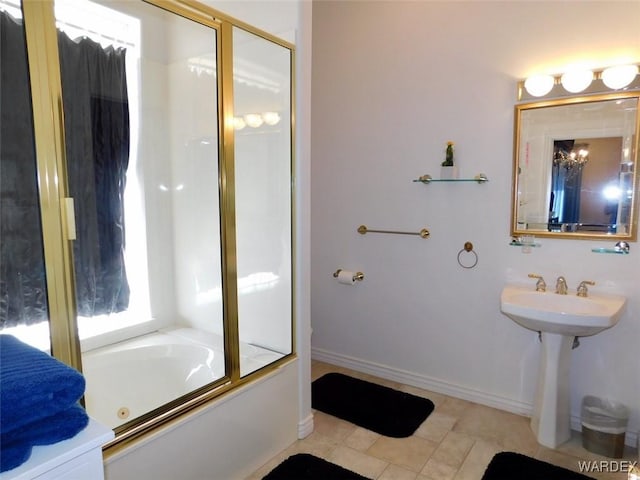 full bathroom featuring enclosed tub / shower combo, tile patterned floors, and baseboards