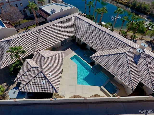 drone / aerial view featuring a water view