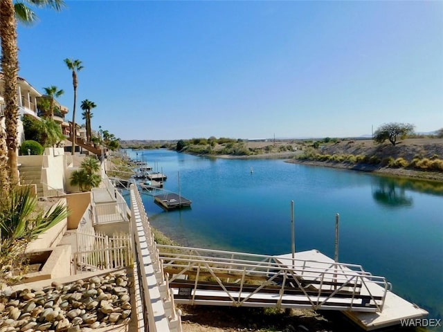 view of dock with a water view