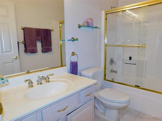 full bathroom with toilet, shower / bath combination with glass door, marble finish floor, and vanity