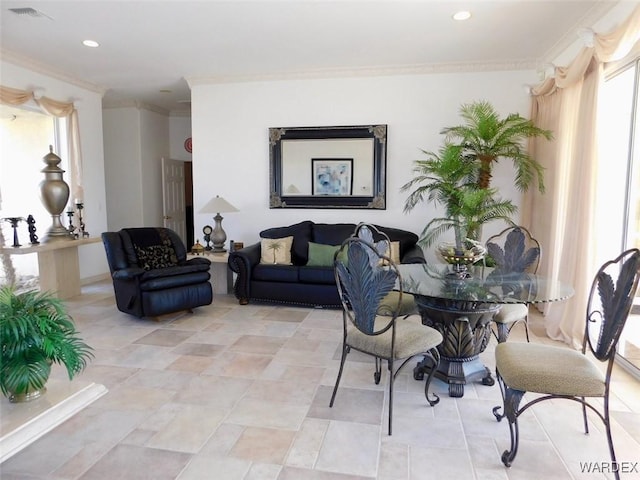 interior space featuring visible vents, crown molding, and recessed lighting