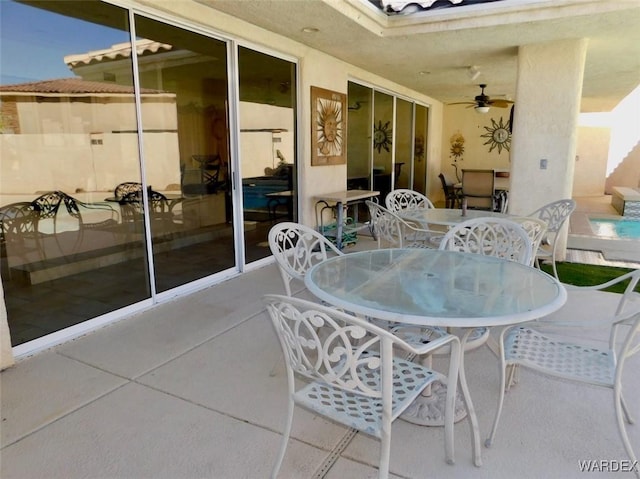 view of patio / terrace featuring ceiling fan and outdoor dining space