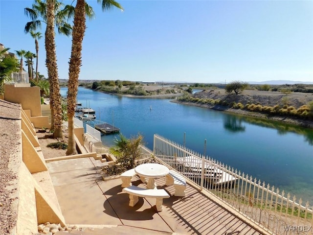 water view featuring a floating dock