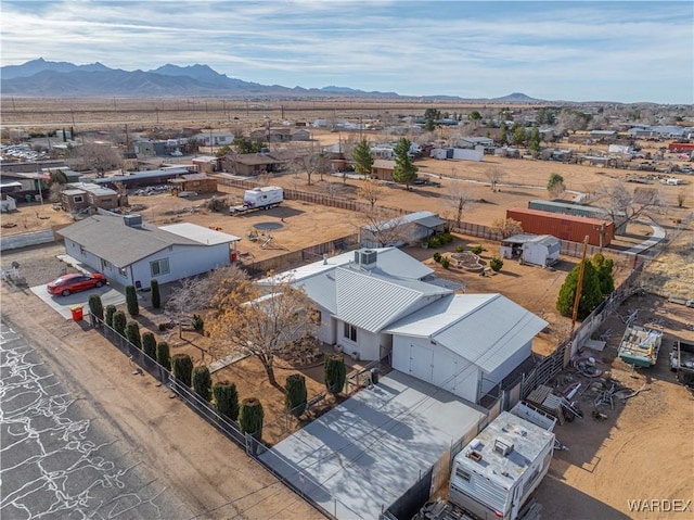 drone / aerial view featuring a mountain view