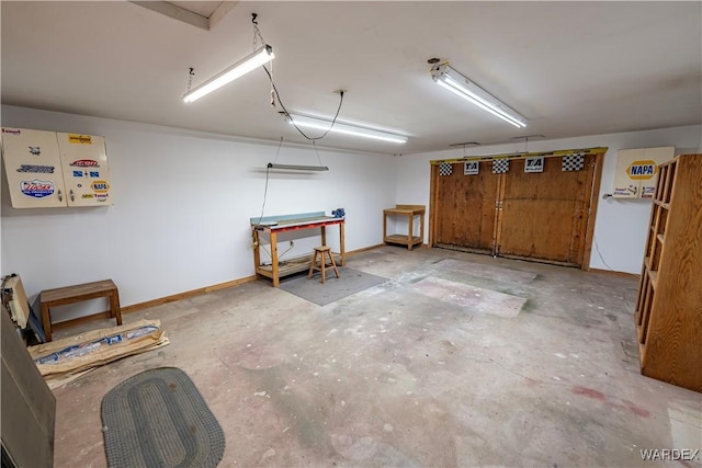 garage with baseboards