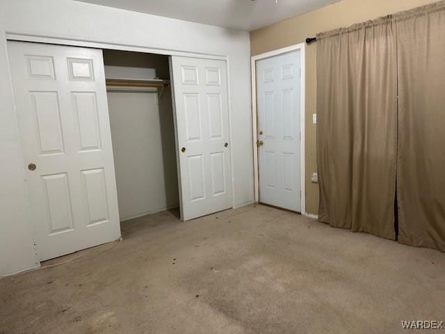 unfurnished bedroom with a closet