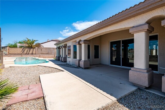 view of pool featuring a patio, fence, and a fenced in pool