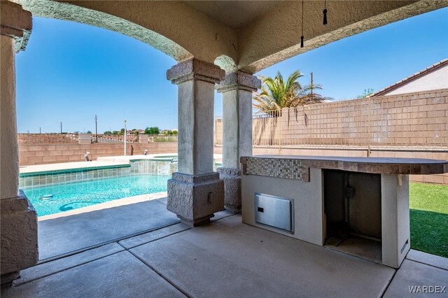 view of pool featuring area for grilling, a patio area, a fenced backyard, and a fenced in pool