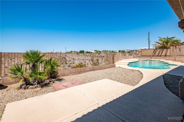 view of swimming pool featuring a patio, a fenced backyard, and a fenced in pool