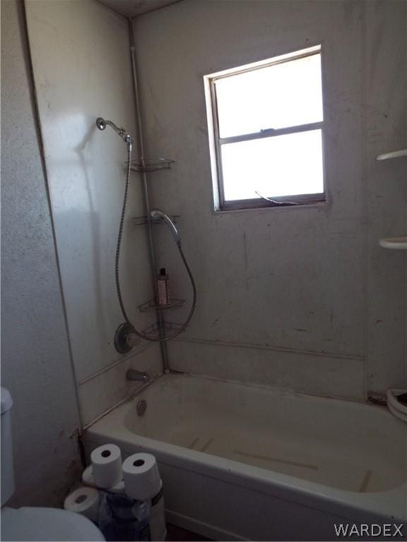 full bathroom with shower / tub combination and toilet
