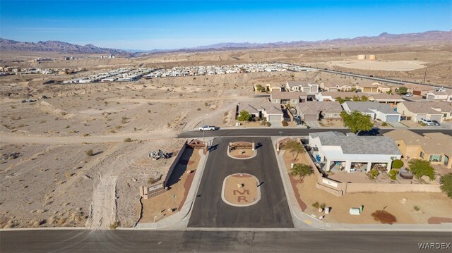 bird's eye view with a residential view and a mountain view