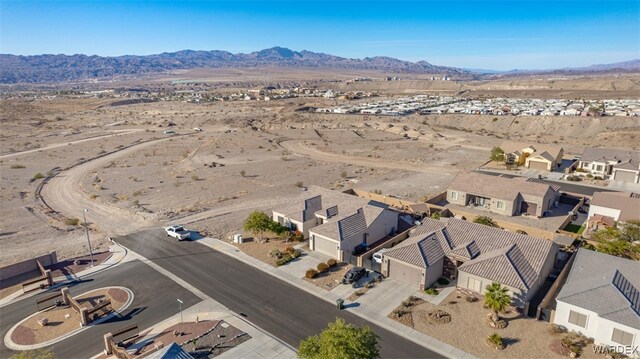 bird's eye view featuring a residential view and a mountain view