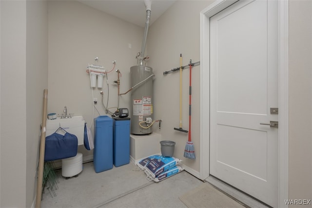 utility room with gas water heater