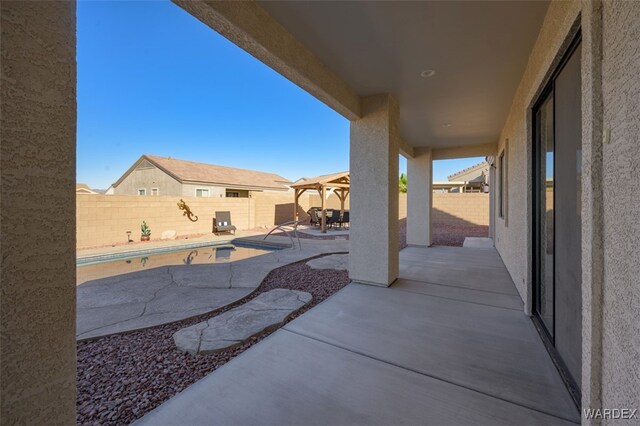 view of patio / terrace featuring a fenced in pool and a fenced backyard