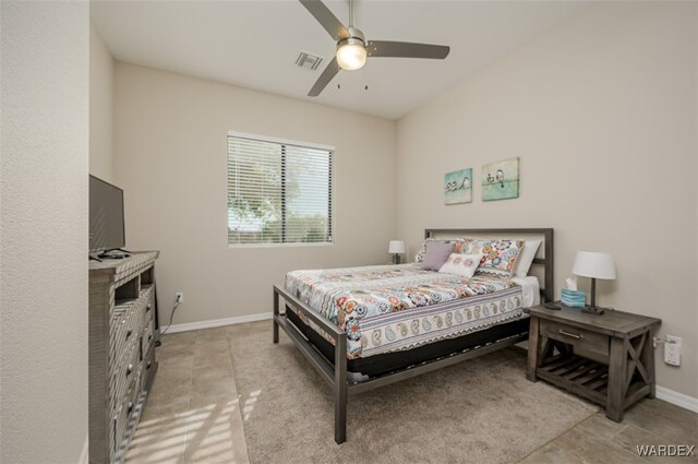 bedroom featuring baseboards, visible vents, and a ceiling fan