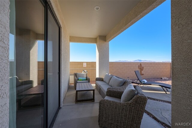 exterior space with a patio area and an outdoor living space