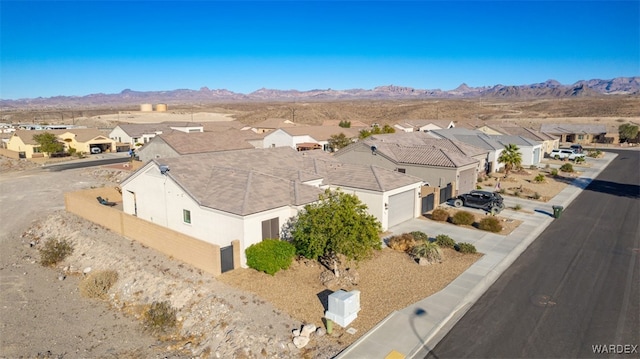 aerial view with a residential view and a mountain view