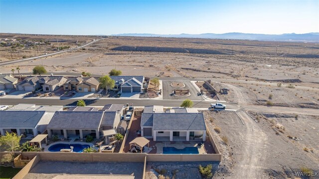 drone / aerial view with a residential view and a mountain view