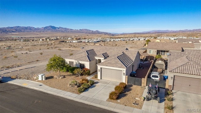 bird's eye view featuring a residential view and a mountain view