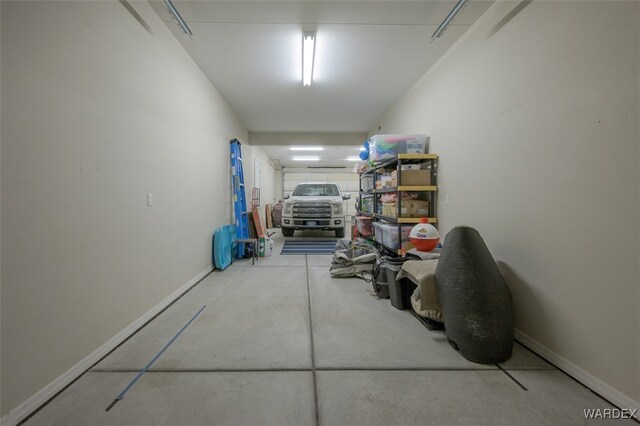 garage featuring baseboards