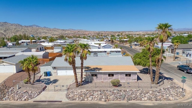 bird's eye view with a residential view and a mountain view