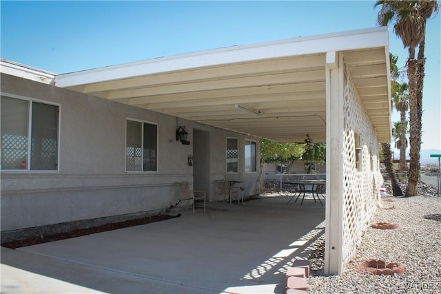 view of patio / terrace featuring an attached carport