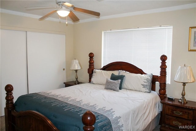 bedroom with a closet and ceiling fan