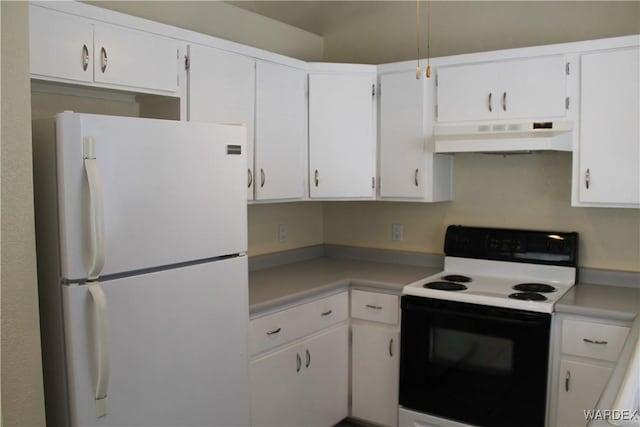 kitchen featuring freestanding refrigerator, light countertops, under cabinet range hood, white cabinetry, and range with electric stovetop