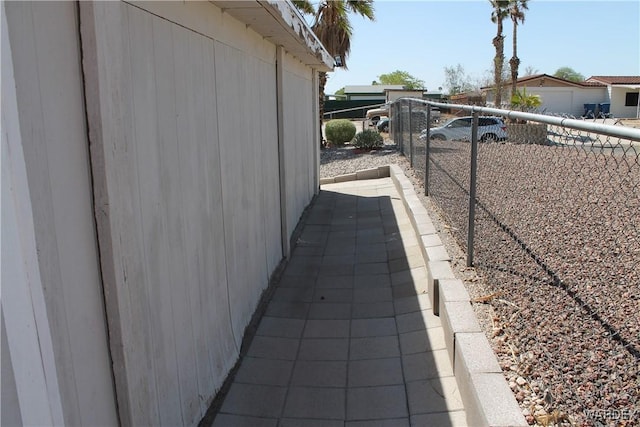 view of property exterior with fence