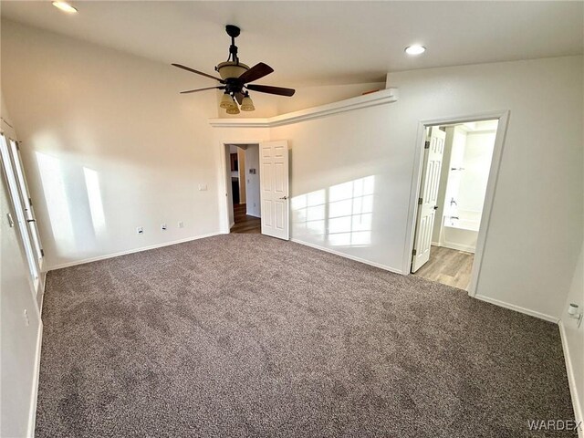 unfurnished bedroom with carpet floors, recessed lighting, connected bathroom, and baseboards