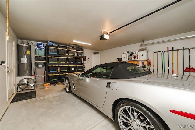 garage featuring a garage door opener and water heater