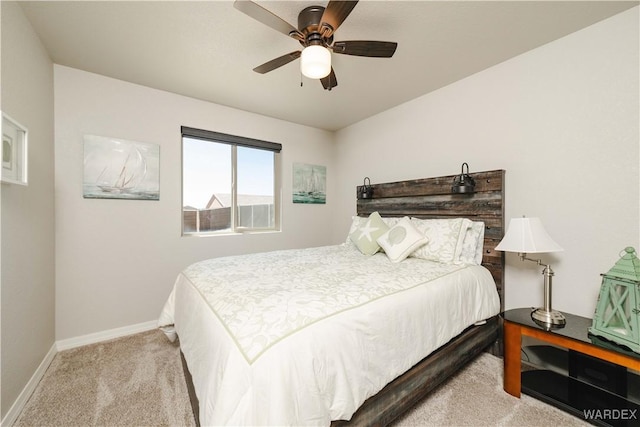 bedroom with carpet floors, baseboards, and ceiling fan