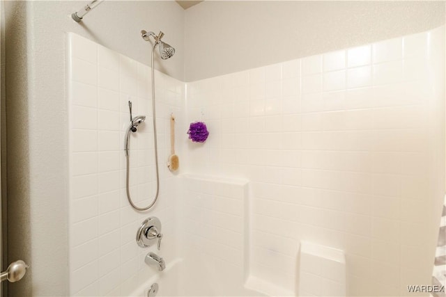 bathroom with shower / bathing tub combination