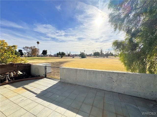 view of patio / terrace featuring a gate