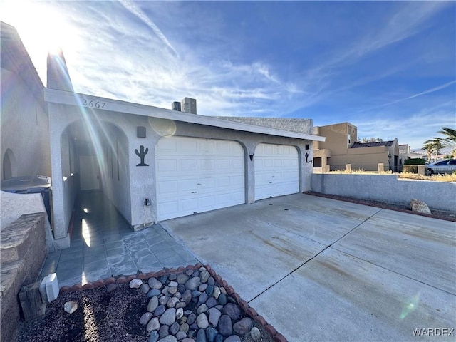 garage with driveway