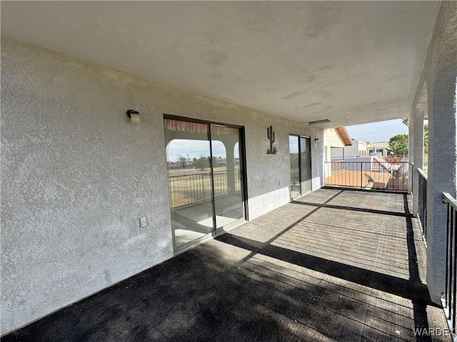 view of patio / terrace with a balcony